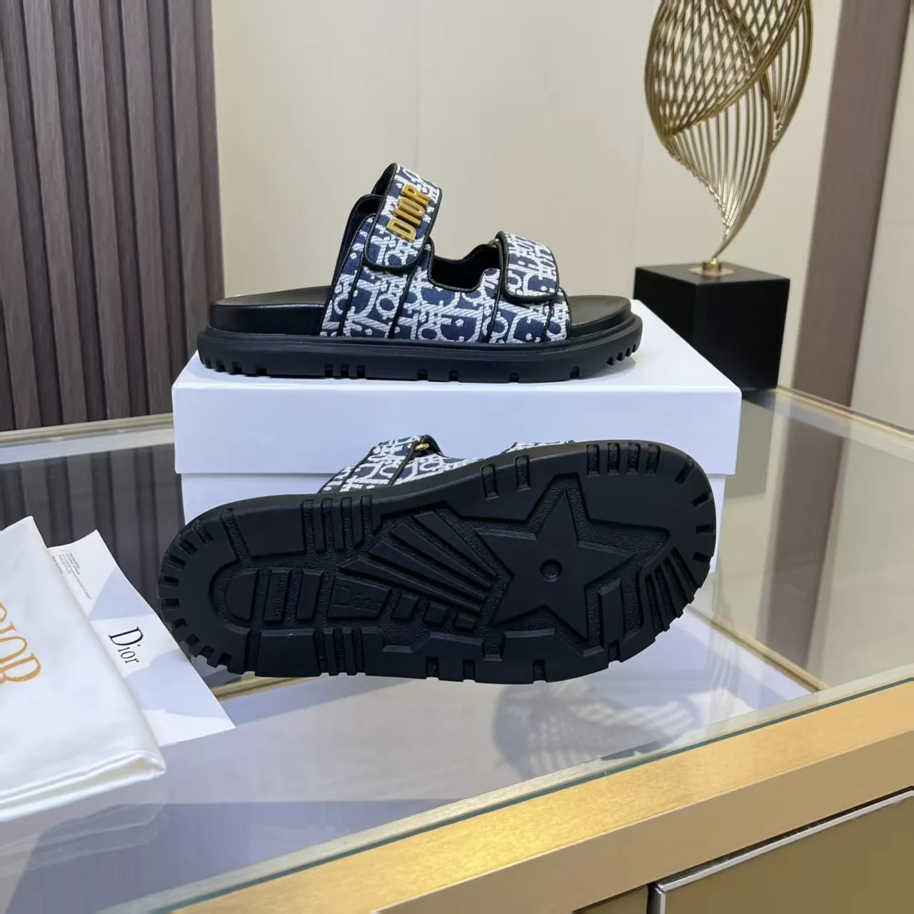 👟👟Ex-factory price 480👟👟 Dior classic popular sandals Step into the fashion territory of Dior slippers and encounter the ultimate fusion of elegance and comfort. The upper is engraved with the Christian Dior Paris logo using exquisite embroidery technology. The delicate stitching tells the brand's profound heritage and is fully recognizable.   Made of high-quality materials, it feels soft and fits your feet, as if it is a gentle care tailor-made for your feet. The sole is carefully designed and engraved with Christian Dior's lucky star symbol. It is not only a beautiful embellishment, but also provides reliable grip, making every step steady and secure.   It has a simple design and is easy to put on and take off. Whether it is a lazy weekend or a pleasant vacation, it can be easily adapted. Whether paired with casual shorts, casual jeans, or an elegant dress, Dior slippers can instantly enhance the overall style and show a casual fashion attitude.   Dior slippers, in the name of fashion, inject luxurious charm into your life and accompany you with every step you take with confidence and elegance. Material: Fine genuine cowhide upper, outsole, TPR, non-slip and wear-resistant, code number: 35-41 (42 customized)